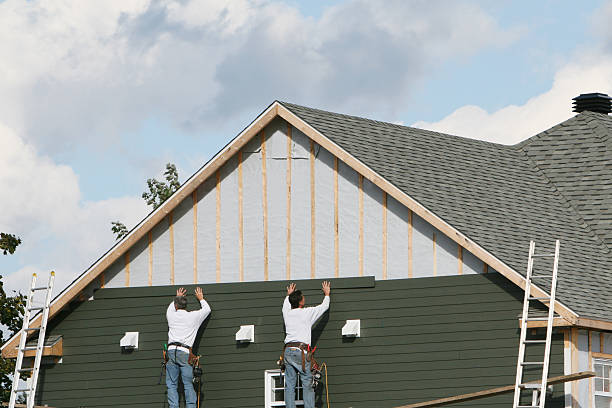 Professional Vinyl Siding technician working in Clayton, NC